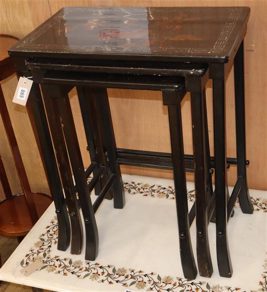 A nest of Chinese lacquer tables W.57cm